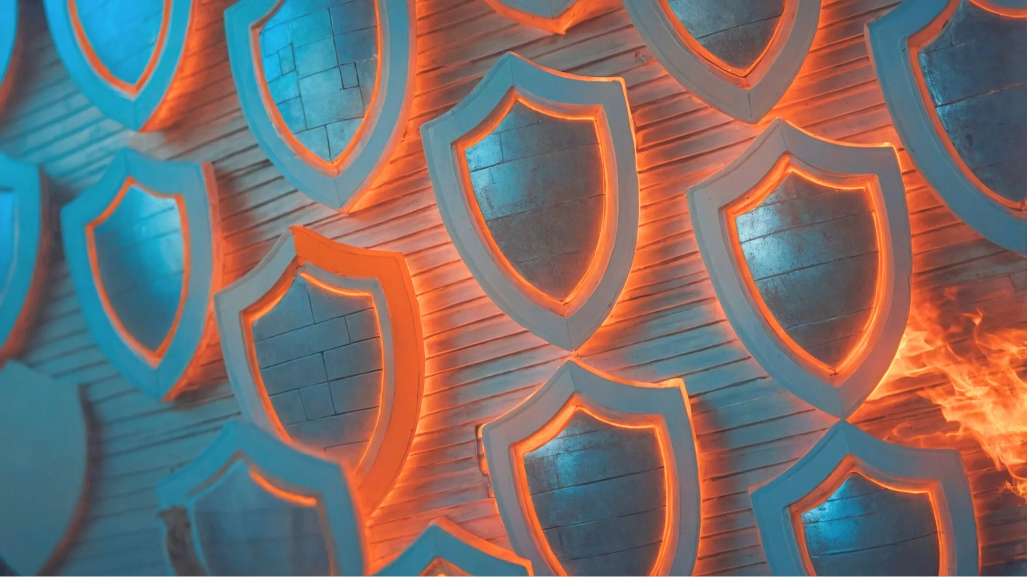 Visuelles Symbol für Managed Firewall Schutzlösungen Leuchtende Schutzschilde als Symbol für zuverlässige Managed Firewall zum Schutz vor Cyberangriffen und Bedrohungen